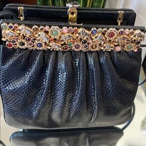 Judith Leiber Black and Gold Clutch with Ornate Clasp